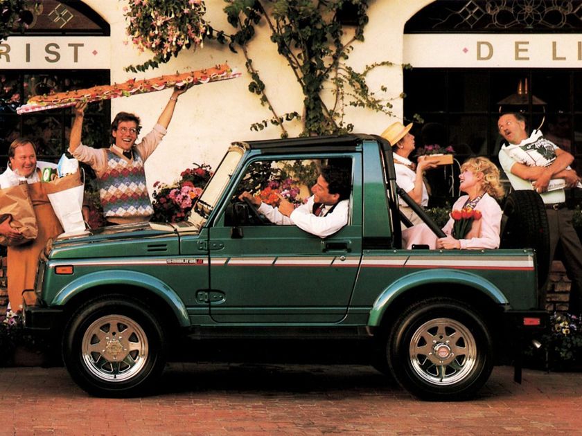 1987 MY, JX Convertible: зелёный, полосы по борту, хромированные «звёздные» диски (аксессуар 43210-80051) — кадр из проспекта 1987 MY