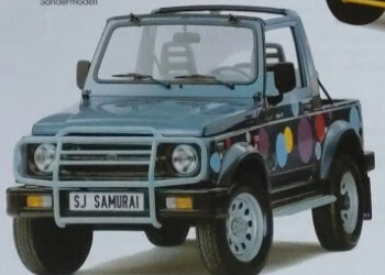 Punkte: разноцветные круги на борту серо-голубого Cabrio
