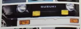 Suzuki Canada Personal.: жёлтые прямоугольные фары в решётке