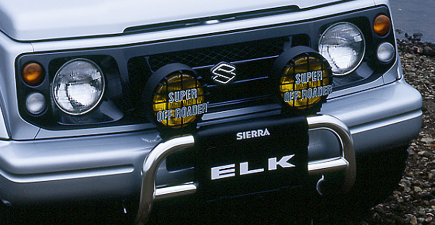 Jimny Sierra ELK: жёлтые противотуманки с накладками SUPER OFF ROADER